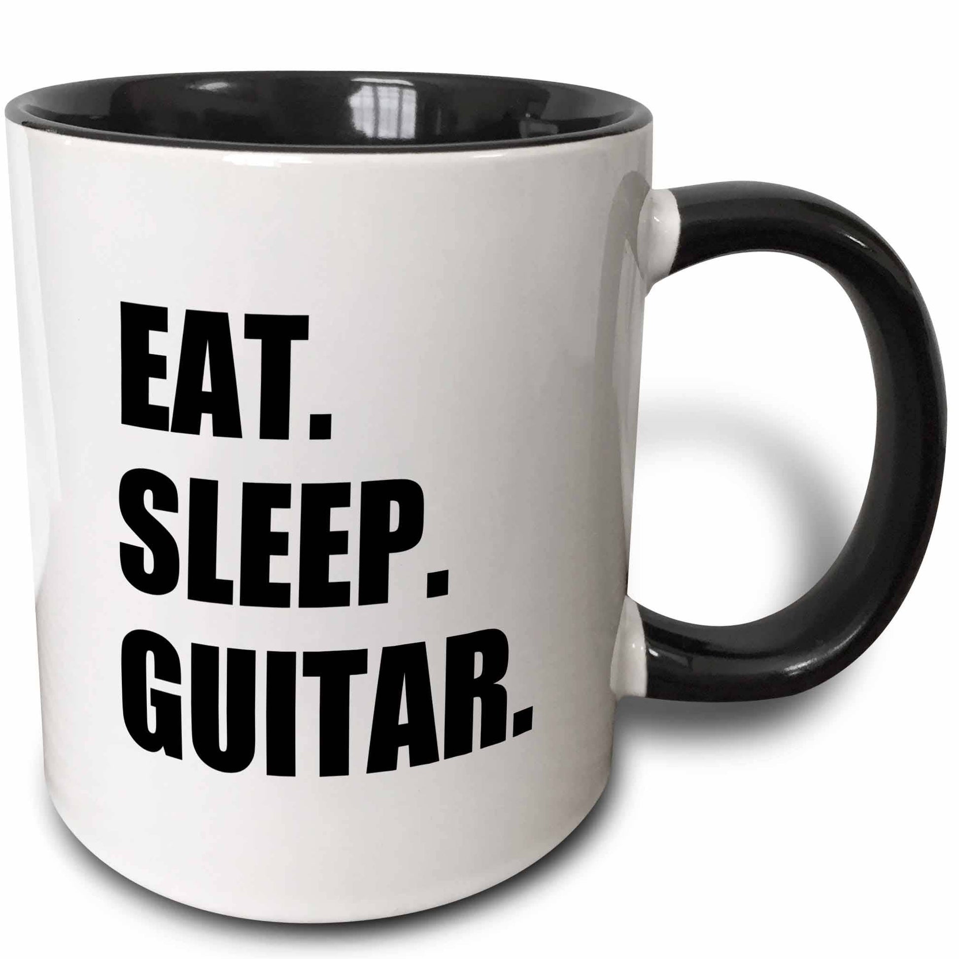 White mug with black interior and handle, featuring 'Eat. Sleep. Guitar.' text.